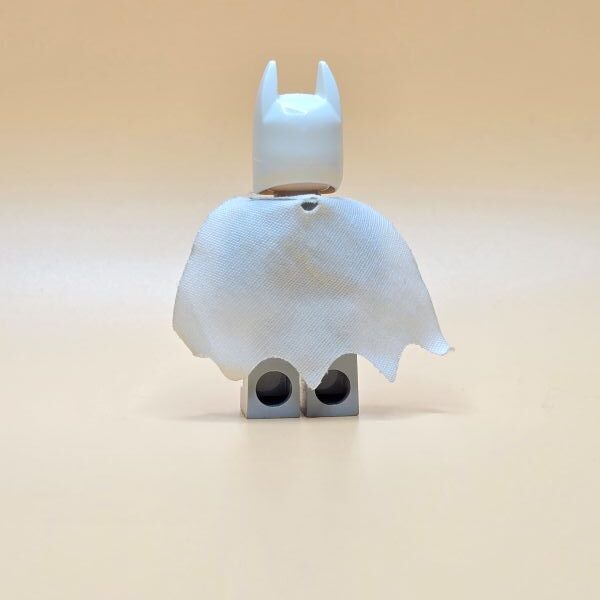 LEGO Arctic Batman sh0047 – Gebraucht. Weißer Batman im Winter-Outfit mit schwarzem Cape. Superheldenfigur aus der DC Super Heroes Serie.